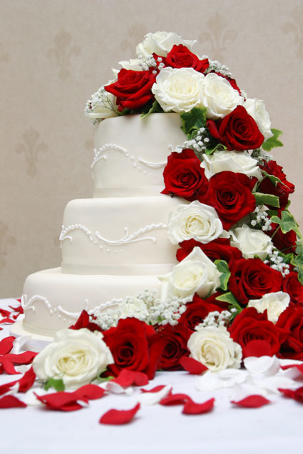 wedding cake with roses Beautifully iced and decorated cakes immediately 