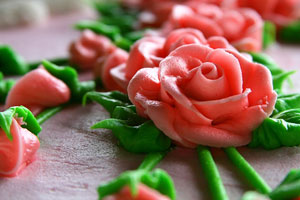 icing roses made with petal and leaf tips